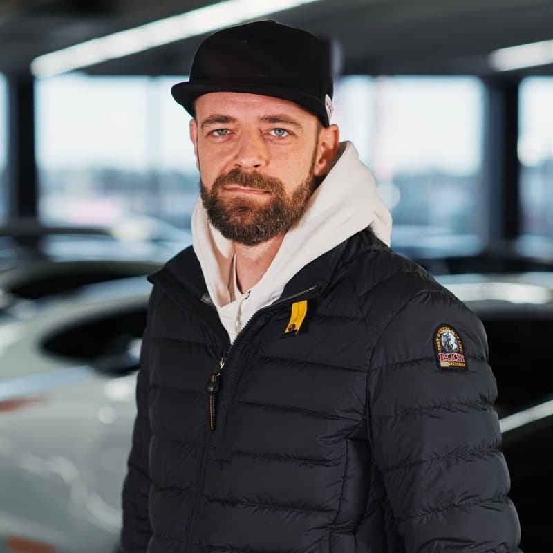 Samu Palomäki, founder of Tradlo, at a dealership